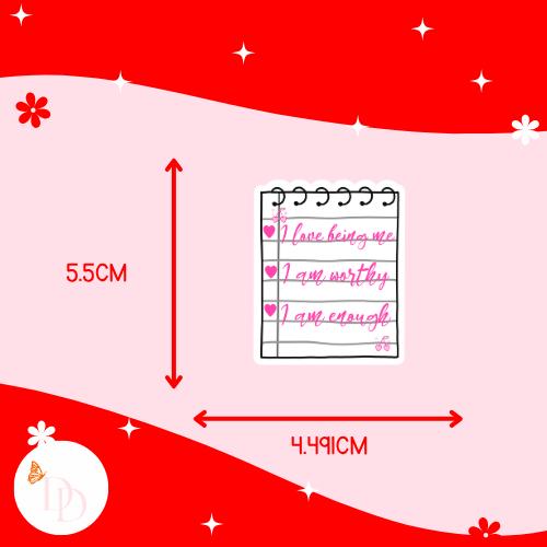 Measurement chart with text and dimensions on a red and pink background showing that a sticker is 5.5cm high and 4.491cm wide